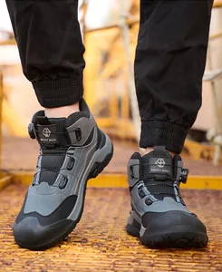 Close-up of men's high-top safety shoes with steel toe and innovative knob lacing system