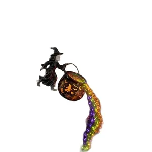 Halloween witch cauldron garden light with colorful LED waterfall string lights.