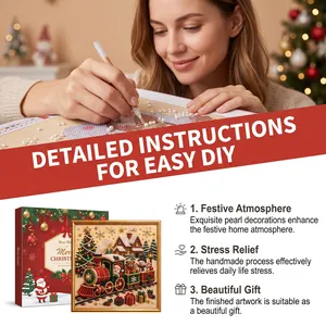 Nahaufnahme des DIY-Perlen-Diamant-Malprozesses mit weihnachtlichem Zugmotiv