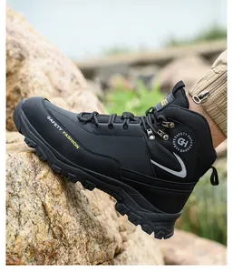 Detailed side view of black steel toe safety work boots for men with rugged grip