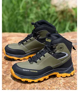Durable green steel-toe safety boots for men with puncture-resistant rugged soles.