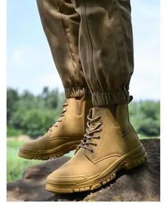 Detailed side view of durable men's high-top safety work boots featuring steel toe protection