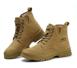 Close-up of khaki high-top safety boots with warm fur lining and side logo detail