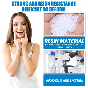 Detailed macro view showing safe white resin material beads for temporary tooth repair kit