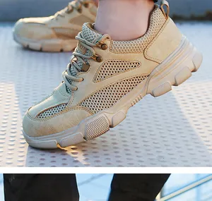Gros plan de chaussures de sécurité kaki respirantes avec empiècements en maille et semelle