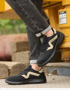 Detail view of breathable black safety shoes with steel toe in industrial setting