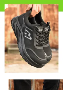 Detailed view of breathable black mesh steel toe safety shoes for heavy industrial work