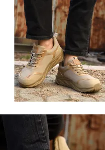 Detail shot of men's khaki breathable mesh safety shoes with anti-smash steel toe protection