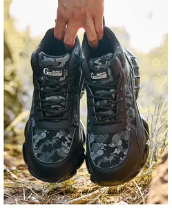 Detailed macro view of men's steel toe safety work shoes with grey camouflage pattern