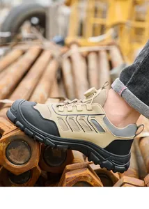 Detailed side view of tan safety shoes with quick-release knob closure for work.