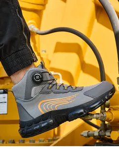 Zapatos de seguridad grises con cierre de dial y punta de acero para obra.