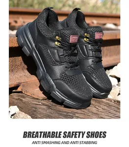Zapatos de seguridad de malla negra transpirables con punta de acero para trabajo externo.