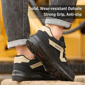 Durable black and beige safety shoes with non-slip solid outsole for work