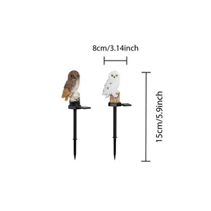 Detailed size view of decorative owl-shaped solar garden stakes in brown and white.
