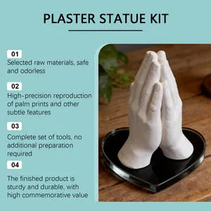 Detail of finished 3D plaster hand statue on heart base with feature highlights