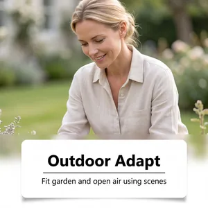 A woman uses multi-purpose outdoor landscape pegs to secure garden fixtures in open air
