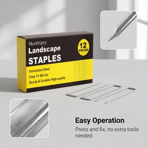 Close-up detail of galvanized steel landscape staples and packaging box showing pointed tips.