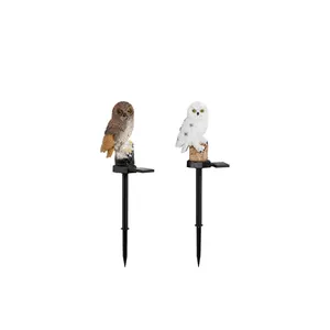 Realistic solar powered owl garden stake lights set featuring brown and white resin designs