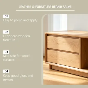 Detail der Leder- und Möbelreparaturcreme zeigt glatte Holzoberfläche des Schranks