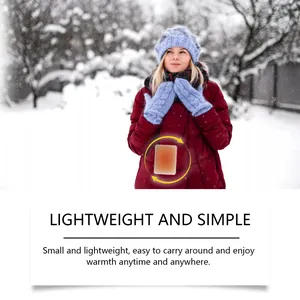 Patch chauffant jetable portable utilisé pour la chaleur dans une scène d'hiver enneigée