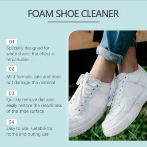 Detailed view of spotless white sneakers after treatment with professional foam shoe cleaner