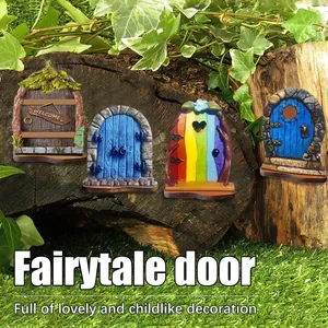 Detailed view of four colorful miniature fairytale doors for garden tree decoration.