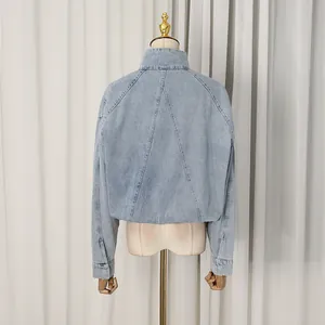 Detailed back view of a light blue casual loose-fit denim jacket for women's autumn wear