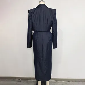 Detailed back view of an elegant navy blue denim two-piece set featuring a long skirt