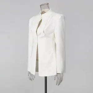 Side view of an elegant white slim-fit blazer with unique cut-out collar design