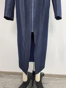 Detail of navy blue denim long dress with front zipper and slit