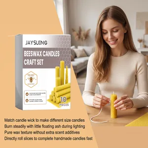 Close-up detail of a handmade DIY beeswax candle making kit with honeycomb sheets