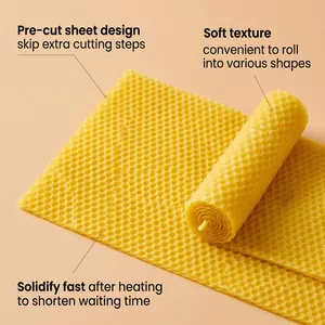 Detail view of honeycomb beeswax sheets for DIY candle making with soft texture