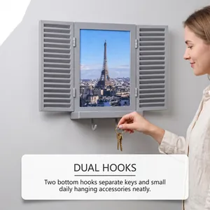Detail view of the gray wall-mounted photo frame key holder with dual hanging hooks