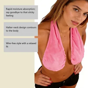 Macro view of a soft pink halter-neck sweat-absorbent towel bra for daily comfort