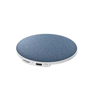 Altavoz de sueño por conducción ósea con superficie de tela azul y diseño blanco