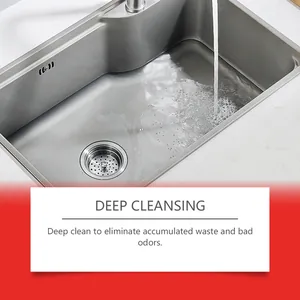 Detail of clean stainless steel sink drain with running water for deep cleansing