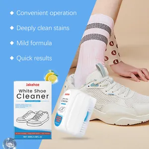 A detailed view of the JAKEHOE white shoe cleaner kit with packaging and application.