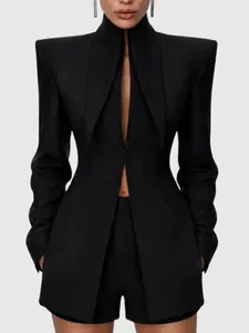 Elegant black structured blazer featuring sharp padded shoulders and deep V-neck for women