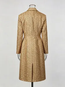 Elegant gold tweed trench coat with notched lapel and cinched waist design, back view