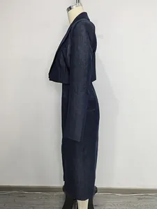 Elegant navy blue denim two-piece suit featuring a cropped blazer and a long maxi skirt for women