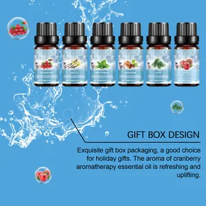 Set of six Jue Fish essential oils with various winter scents in premium gift packaging