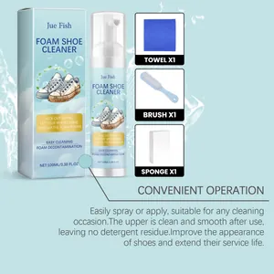Detailed view of the foam shoe cleaner kit featuring a cleaning bottle, towel, brush, and sponge