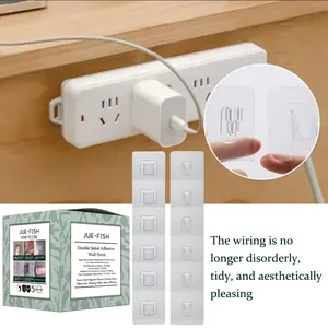 Macro detail of Jue-Fish double-sided adhesive wall hooks and product packaging