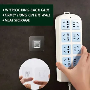 Self-adhesive interlocking wall hooks for punch-free wall-mounted power strip storage