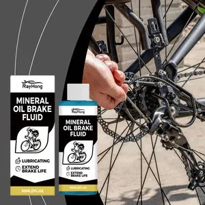 RayHong 60ml mineral oil brake fluid being applied to a bicycle disc brake system