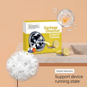 Detailed macro view of orange-scented garbage disposal cleaner tablets with rich foam effect