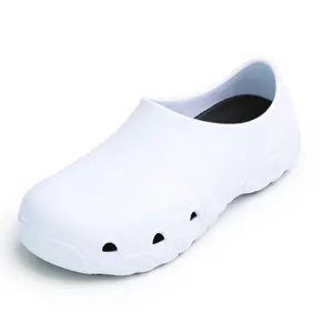 Side view of professional white non-slip chef work shoes with breathable side holes