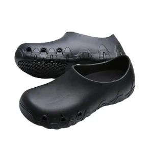 Professional black anti-slip chef shoes, waterproof and oil-resistant work footwear.
