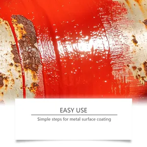 Detailed view of bright red anti-rust paint applied to a rusty metal surface