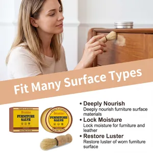Action shot of applying Brunizo furniture salve to restore luster of wooden surfaces